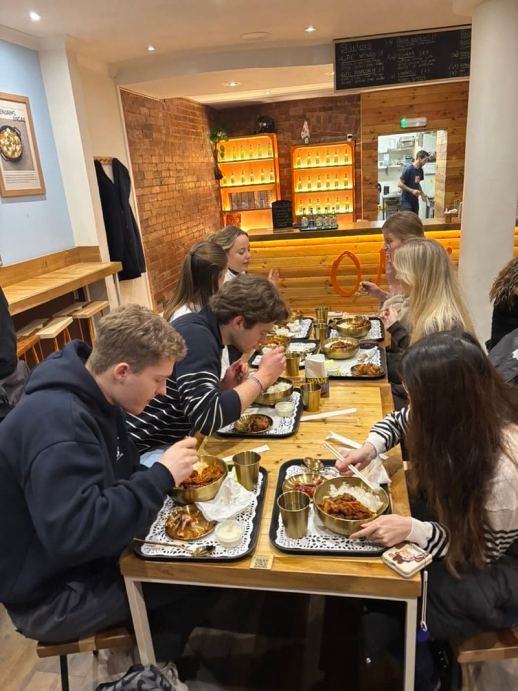 Members sharing a meal together at a society social